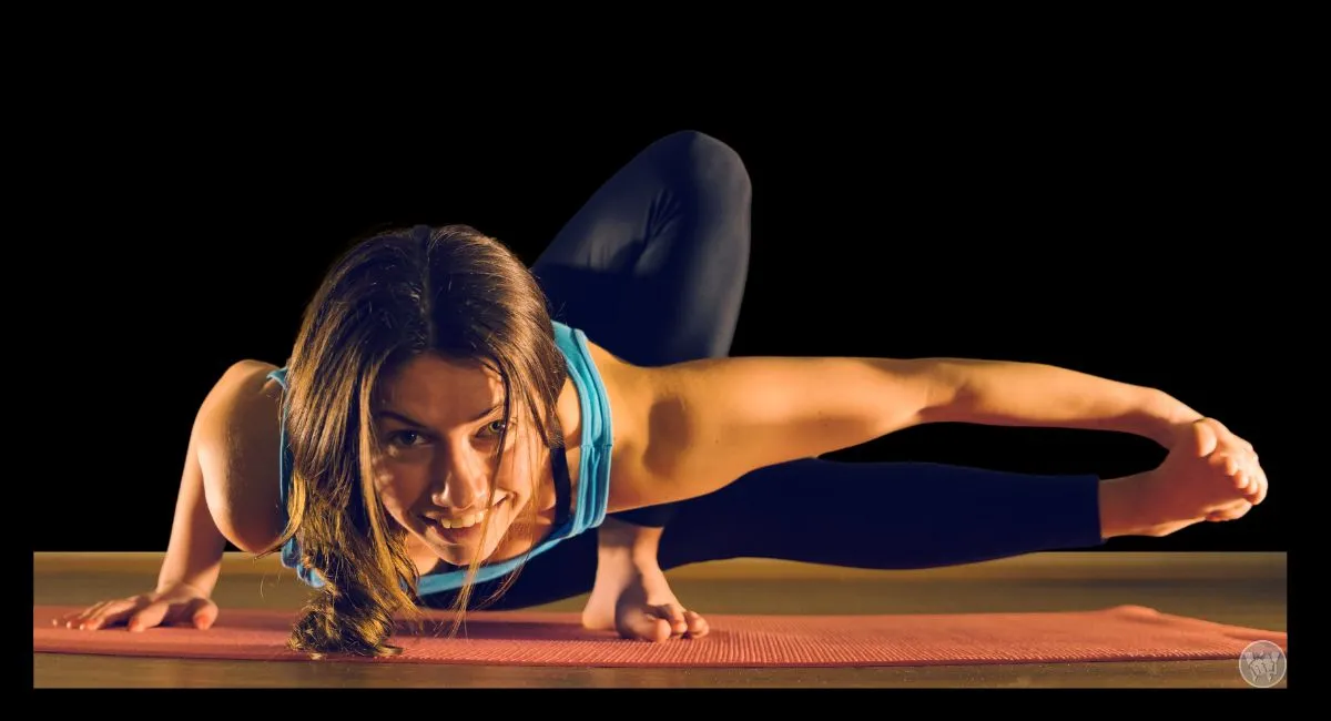 smiling woman doing a flexibility exercise